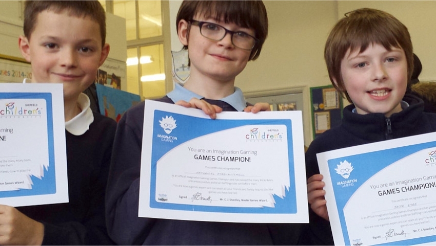 Three children with Imagination Gaming certificates