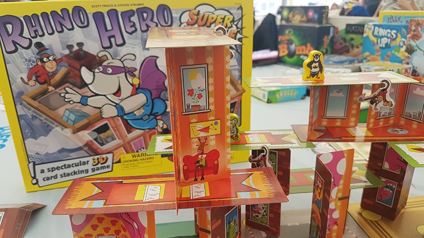 Rhino Hero Game box with the game set up in front of it