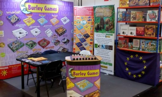 Exhibition stand with banners and games.