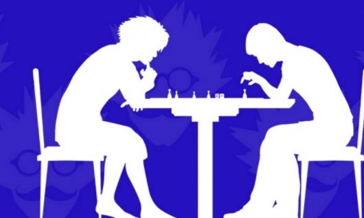 Silhouette of two people playing chess on blue background