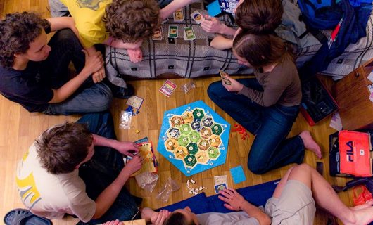 Aerial view of children around a board game
