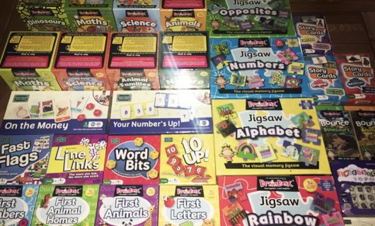 Multiple board game boxes