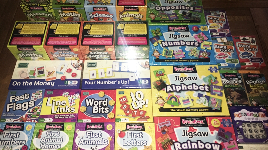 Multiple board game boxes